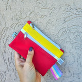 Mini pochette multiuso in tessuto tecnico impermeabile, 3 varianti