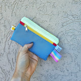 Mini pochette multiuso in tessuto tecnico impermeabile, 3 varianti