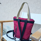 Zaino Enola in tessuto in alcantara verde e bordeaux