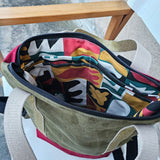 Zaino Enola in tessuto in alcantara verde e bordeaux