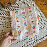Gallinella porta merenda “Fiori di Ricordi” – artigianale in cotone con interno impermeabile